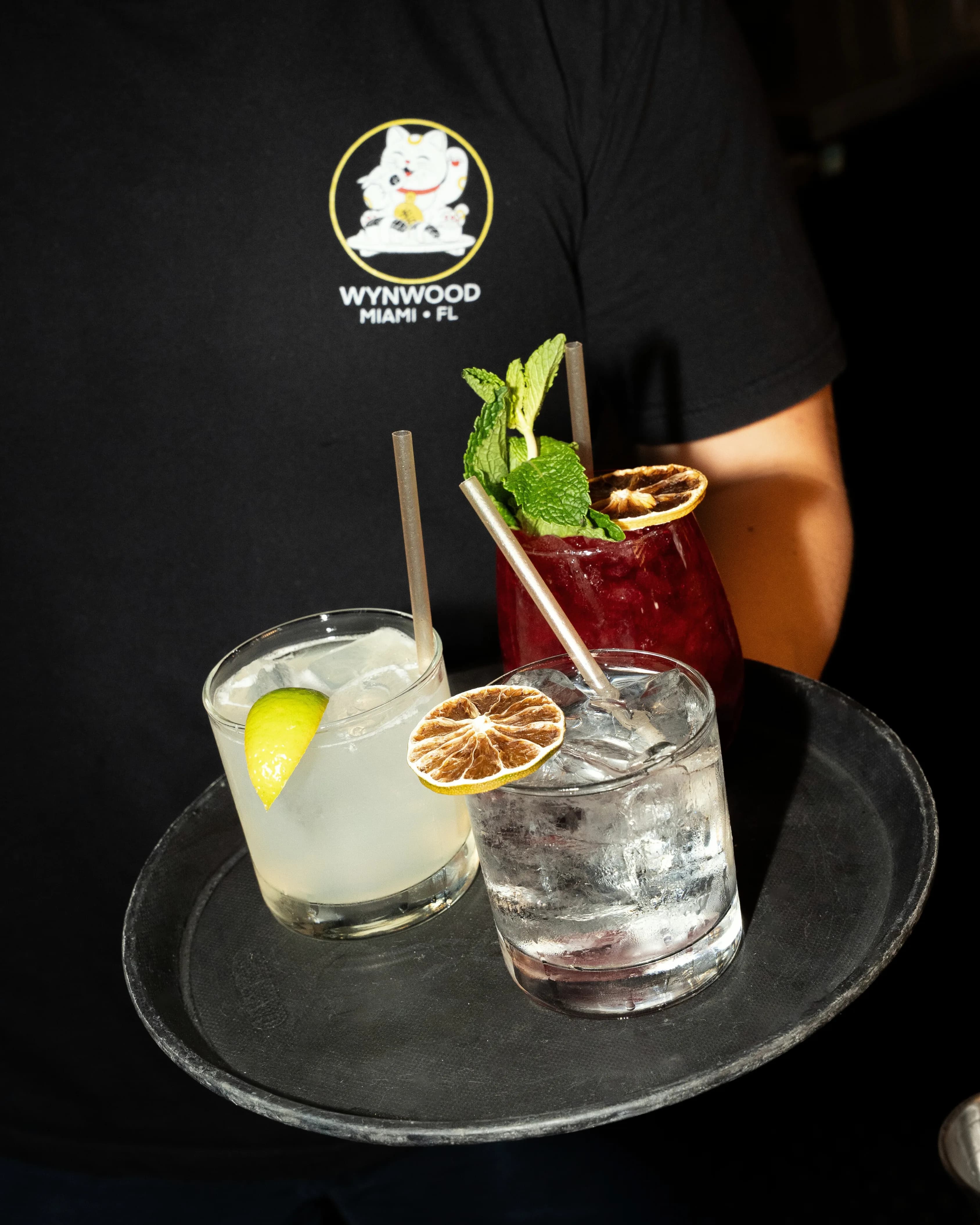 A styled overhead of dishes and drinks at 1-800-Lucky.